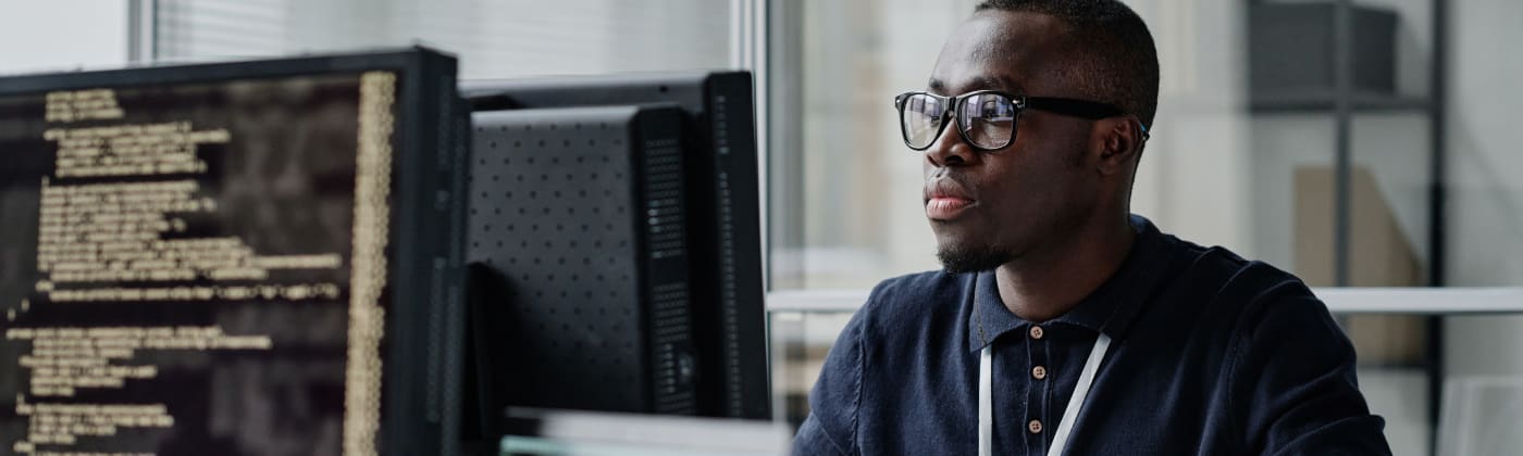 Man working at a computer screen