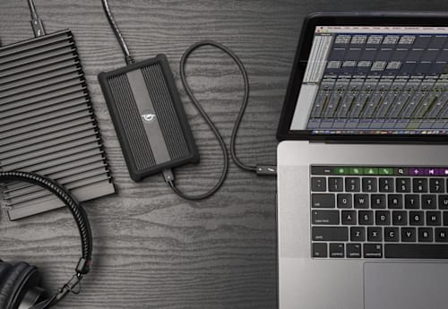 OWC Thunderbolt 4 10G Ethernet Adapter plugged into a MacBook Pro