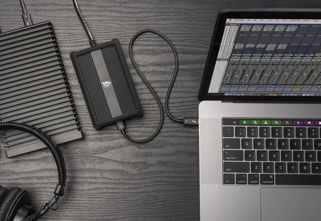 OWC Thunderbolt 4 10G Ethernet Adapter plugged into a MacBook Pro