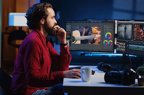 Man working on editing software