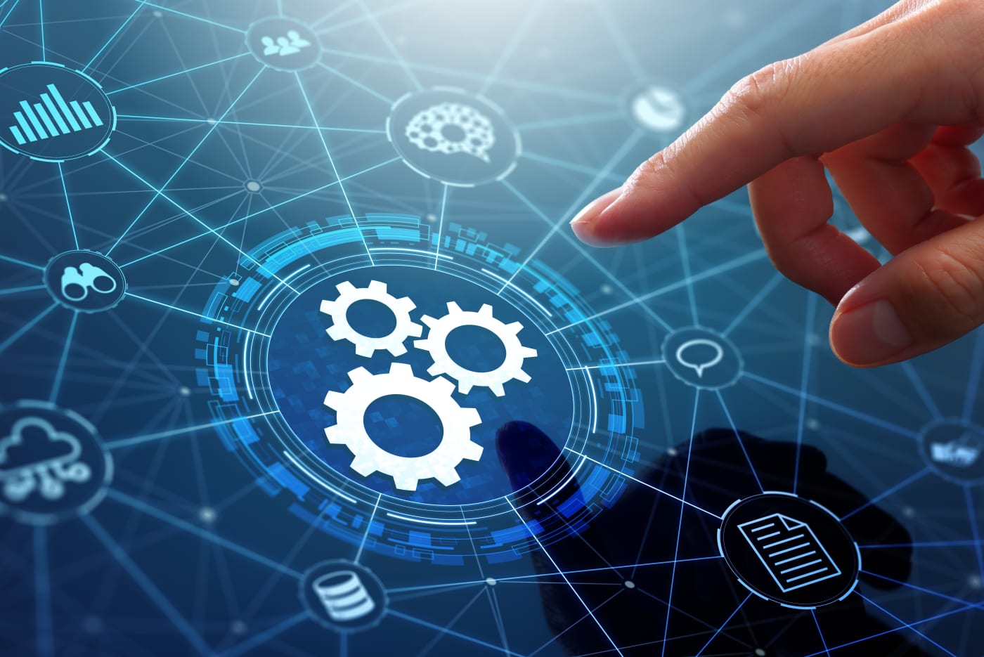 Closeup of hand reaching toward technology graphic