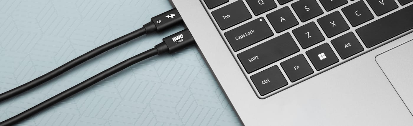 Closeup of MacBook Pro with Thunderbolt 5 cables