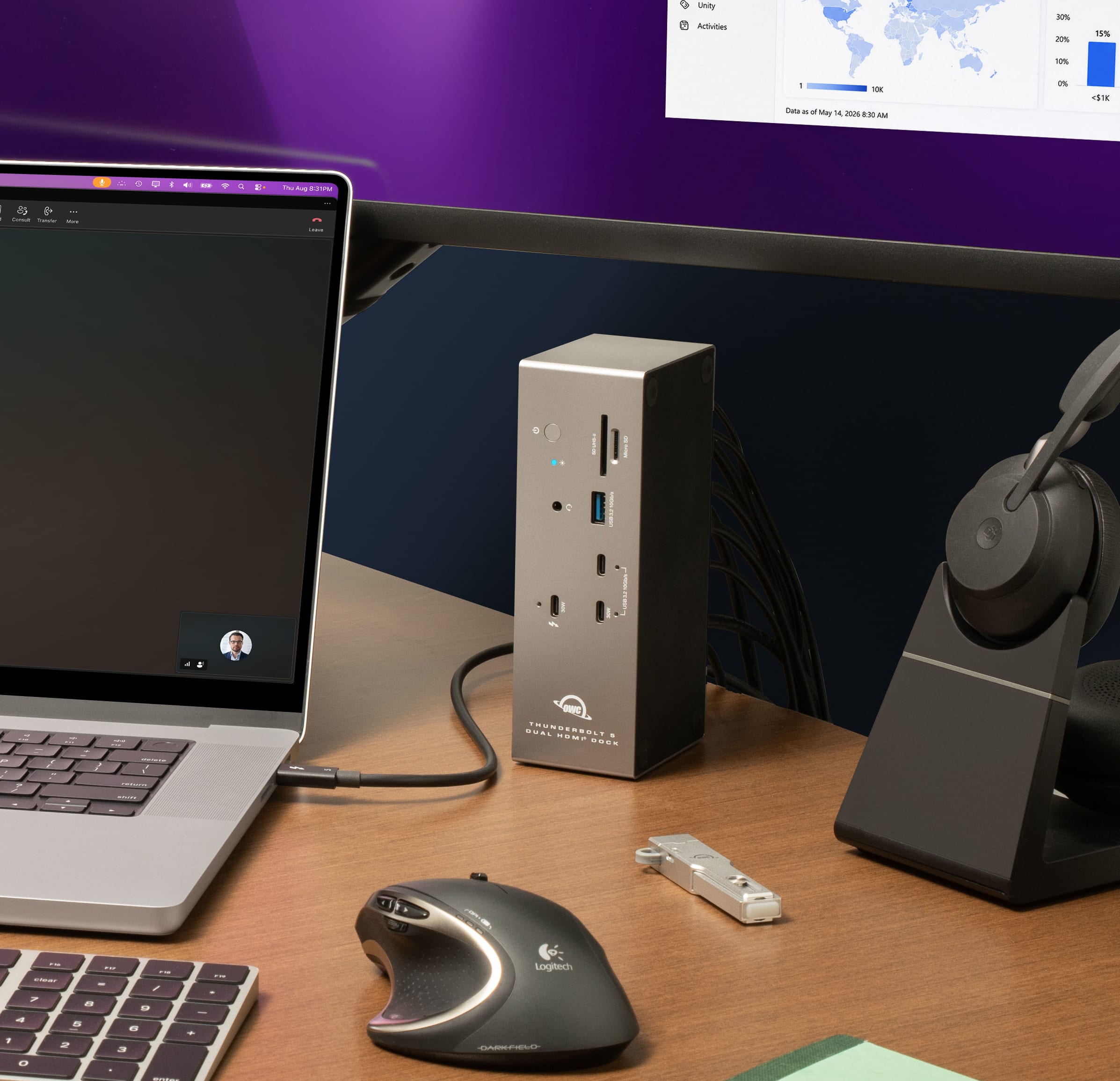 OWC Thunderbolt 5 Dock with Dual HDMI on desktop with MacBook Pro, external display, keyboard, mouse, and other devices