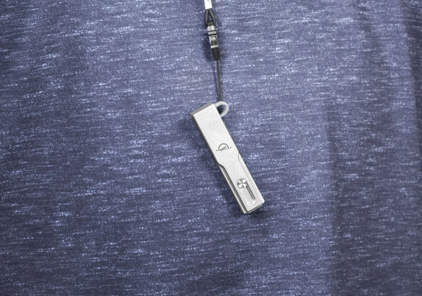 Envoy Pro mini on a lanyard being worn around the neck