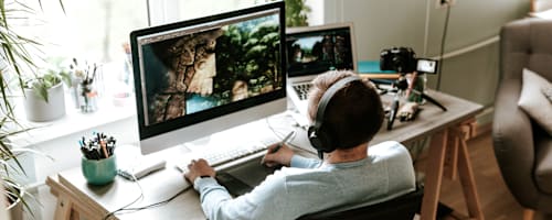 Photographer working at desk
