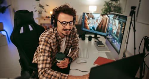 Man at computer workstation