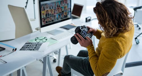 Photographer reviewing images