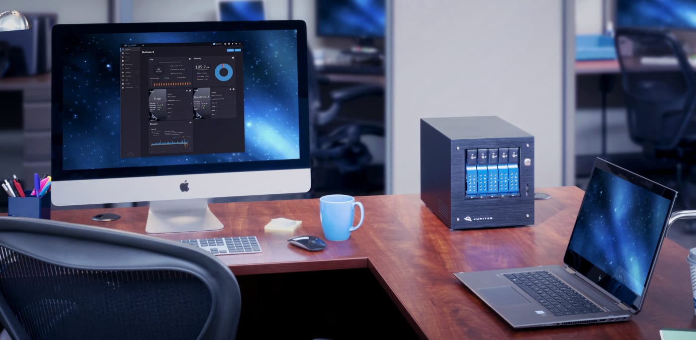 OWC Jupiter Mini on desktop with laptop and iMac