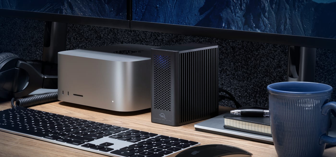 OWC Express 4M2 Ultra on desktop next to Mac Studio