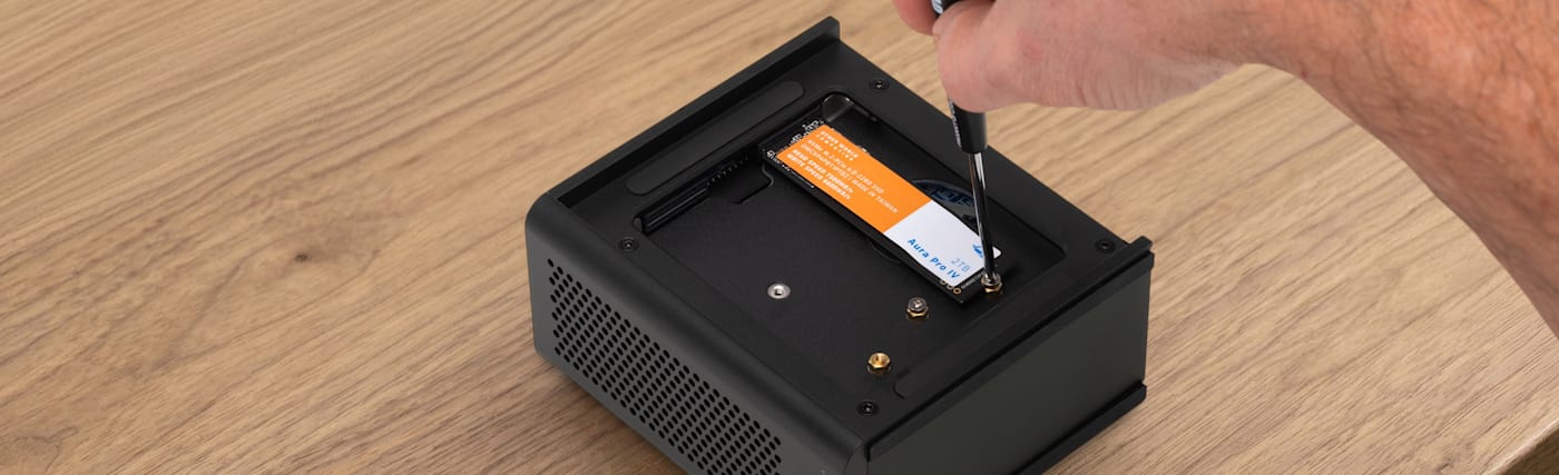 OWC Express 4M2 Ultra on desktop with NVMe M.2 SSD exposed