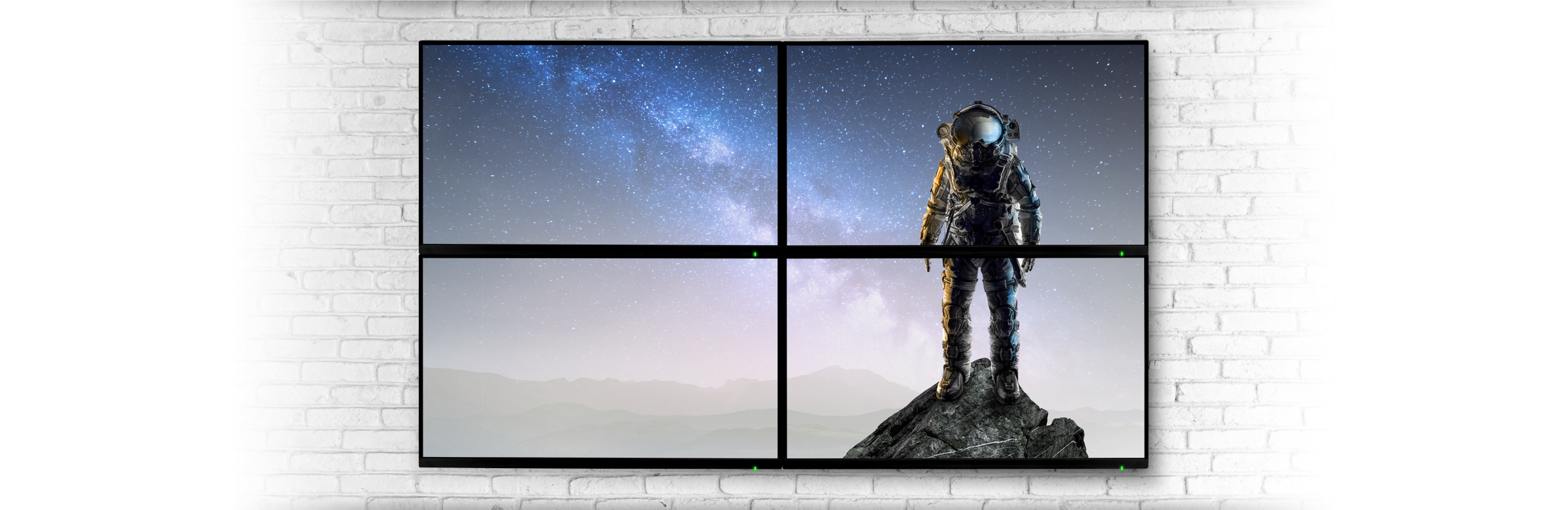 Four displays showing space scene