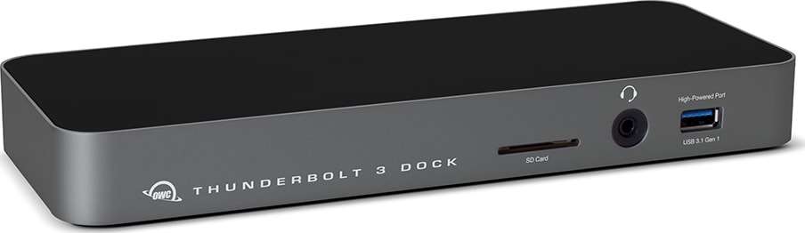 Angled aerial forward facing view of a OWC Thunderbolt 3 Dock illustrating the cosmetics and available ports. From left to right, the front of the dock shows the device name accompanied by an OWC logo, a SD card slot, an audio port, and a USB 3.1 Gen 1 Type-A port. The sides of the dock are dark gray, and the top of the dock is black.