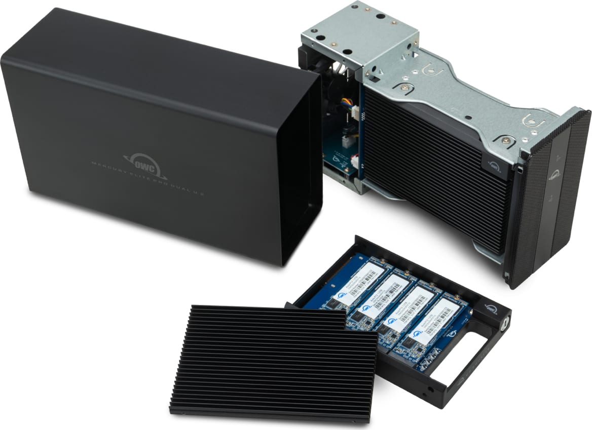 OWC U2 Shuttle on desktop next to a disassembled OWC Mercury Pro U.2 Dual