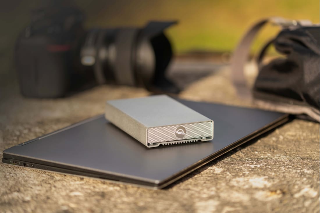 OWC Mercury Elite Pro mini with PC laptop and photography equipment