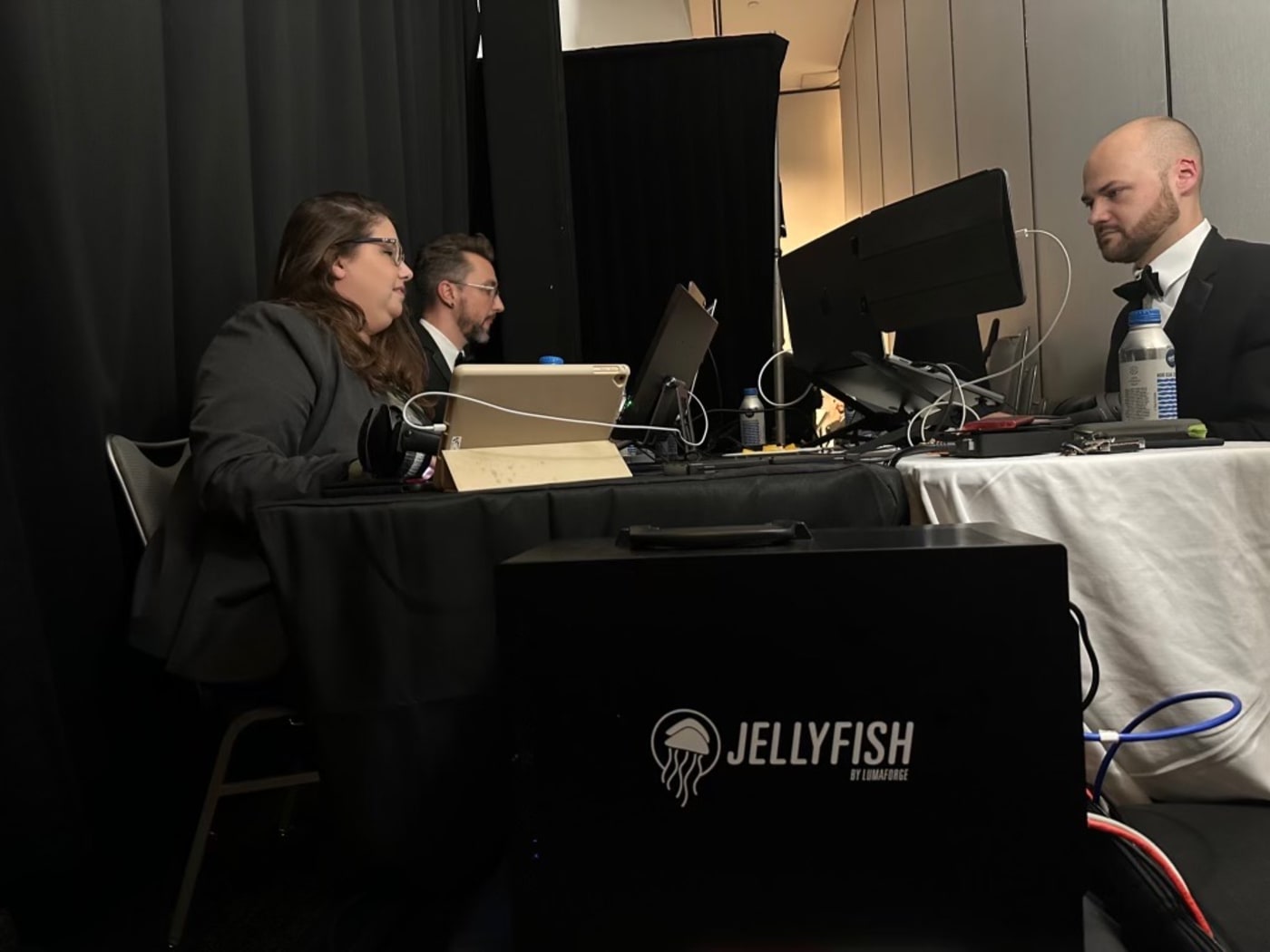 working on three M2 MacBook Pros and one Mac Pro while editing in Premiere Pro—all from a Jellyfish Mobile