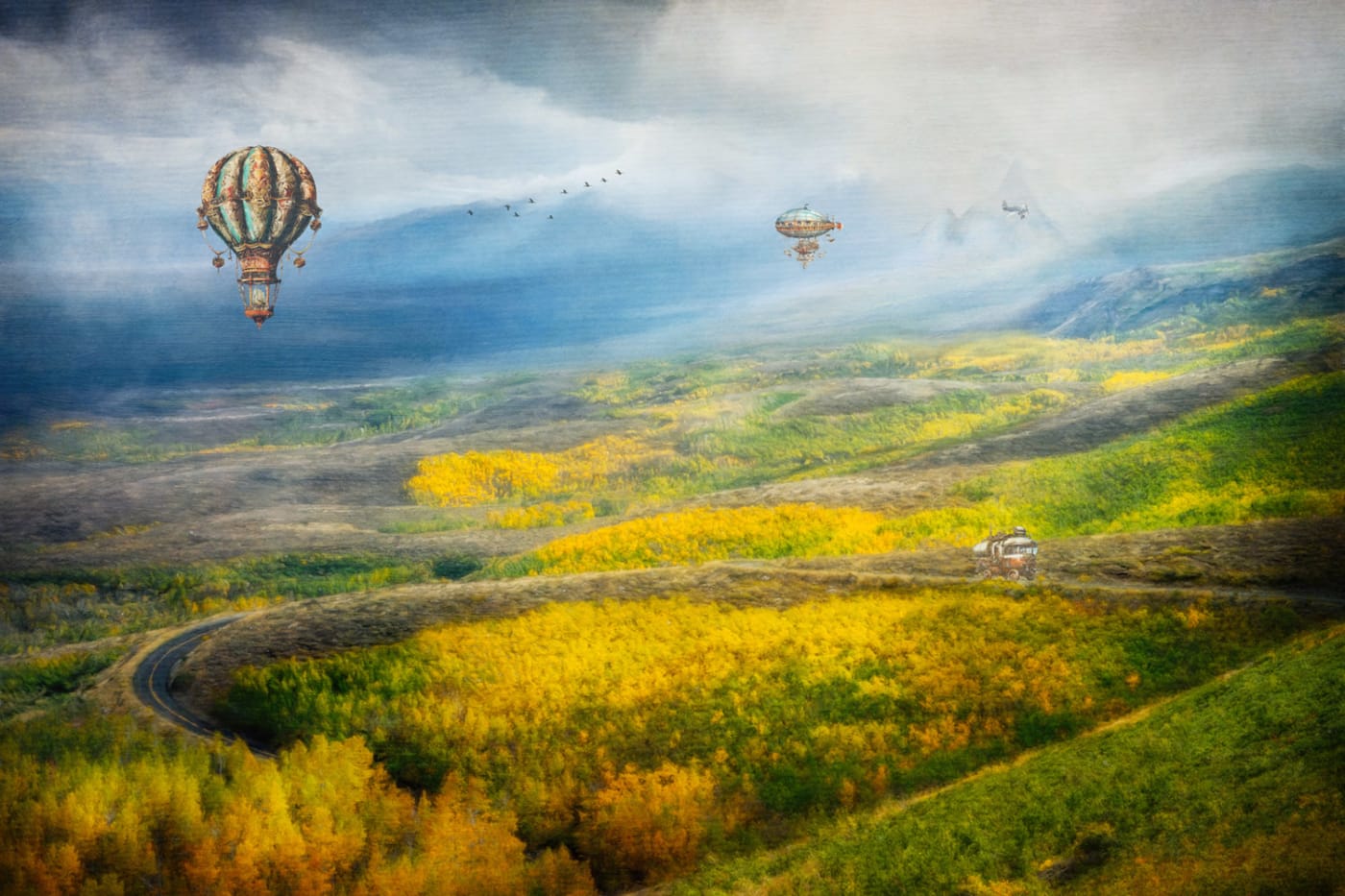 Artwork by Karen Hutton depicting hot air balloons floating above a colorful landscape of rolling hills and forests, with a road winding through the scene and a vehicle in the distance.