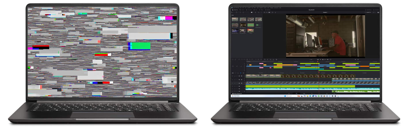 One laptop showing a crash screen next to another laptop showing a working screen