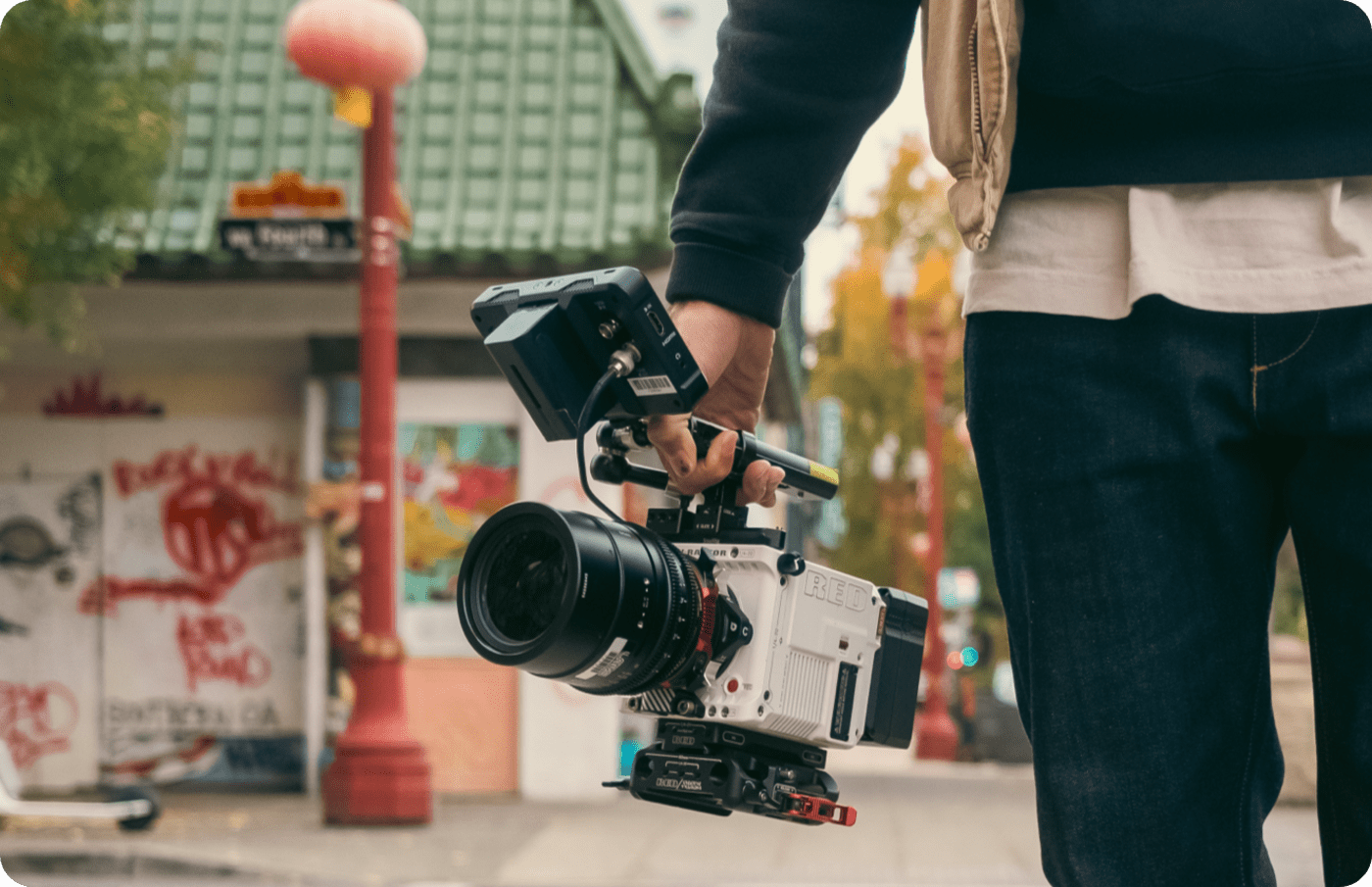 Videographer holding camera