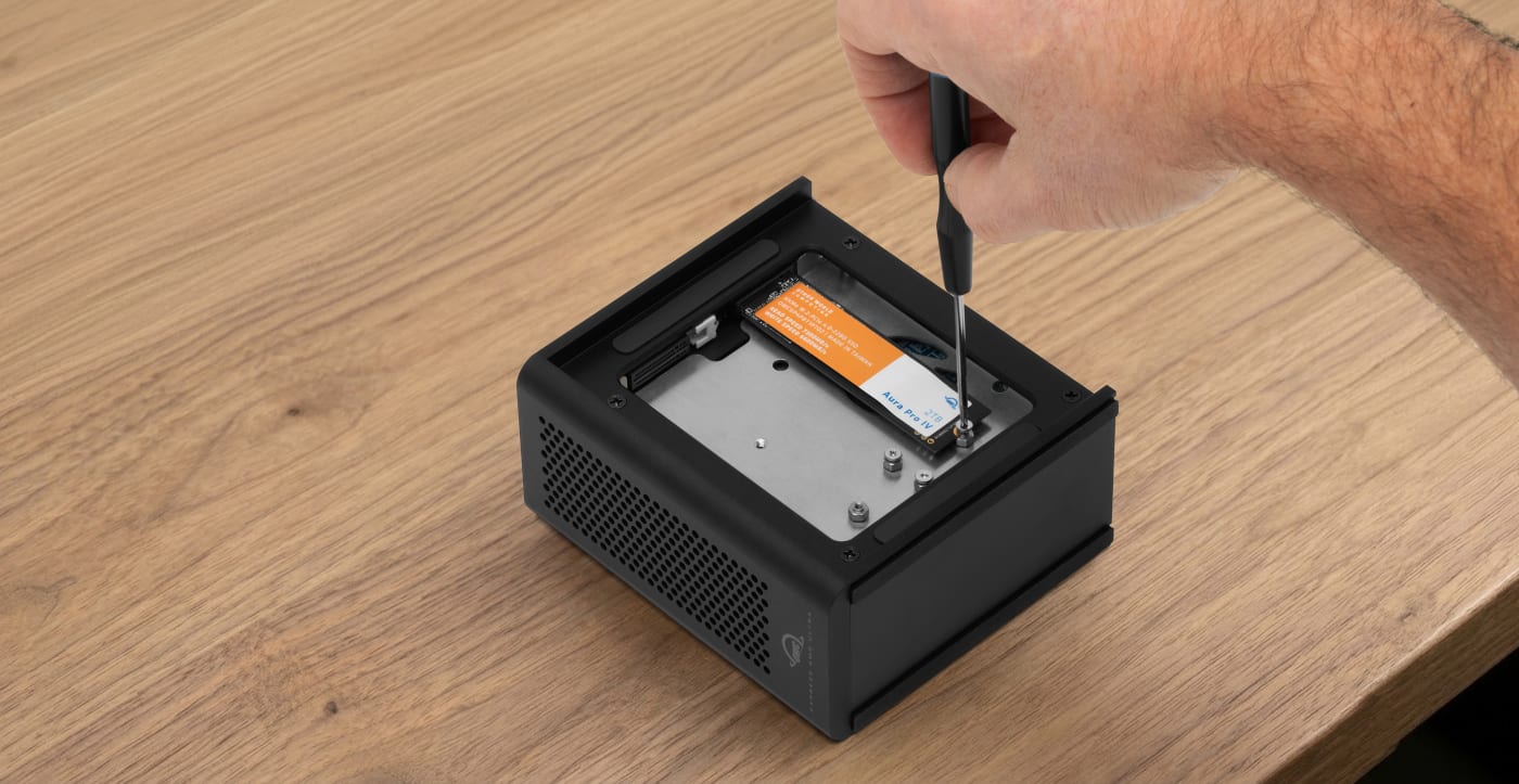 OWC Express 4M2 Ultra on desktop with NVMe M.2 SSD exposed