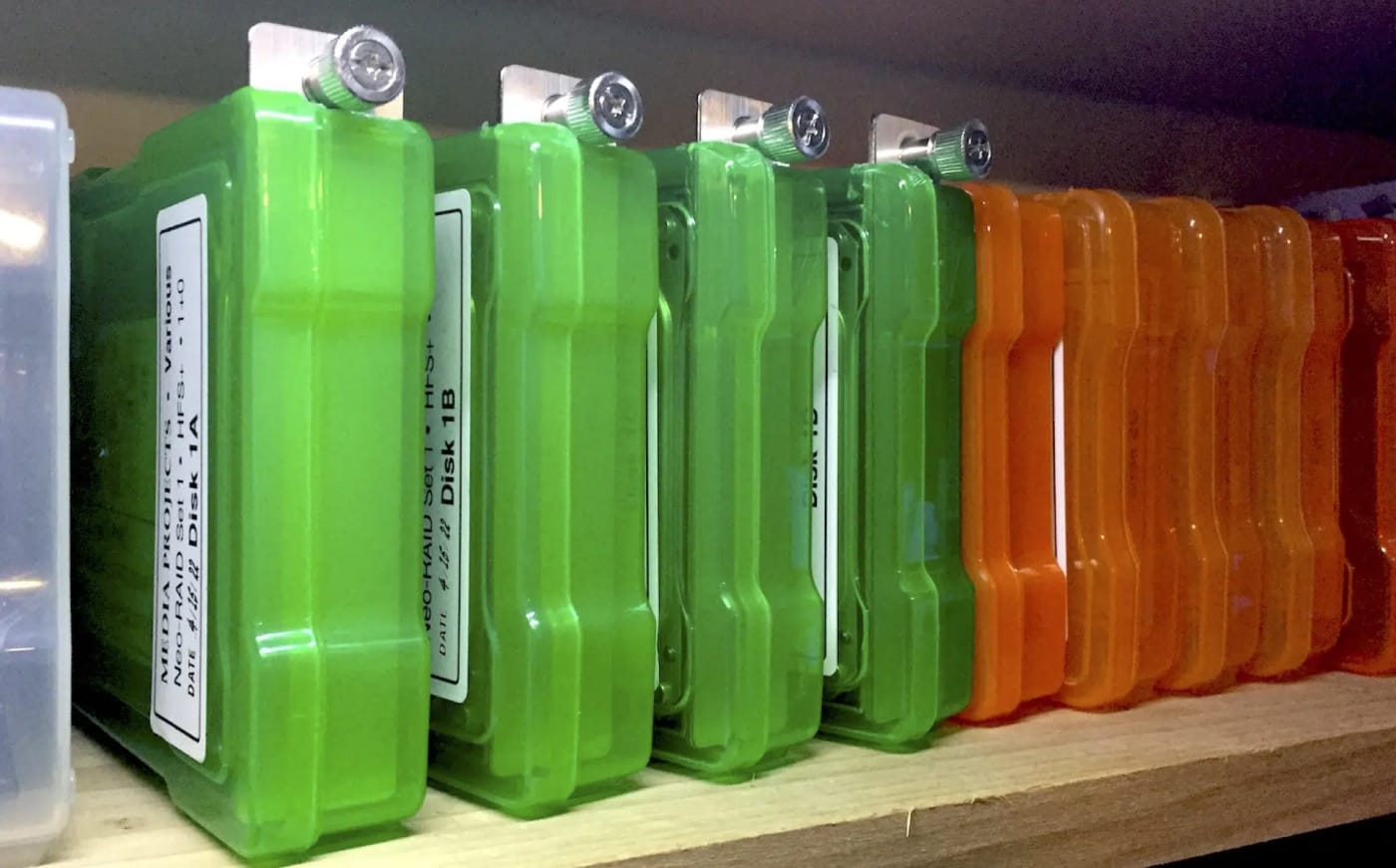 hard drives in storage cases on shelf