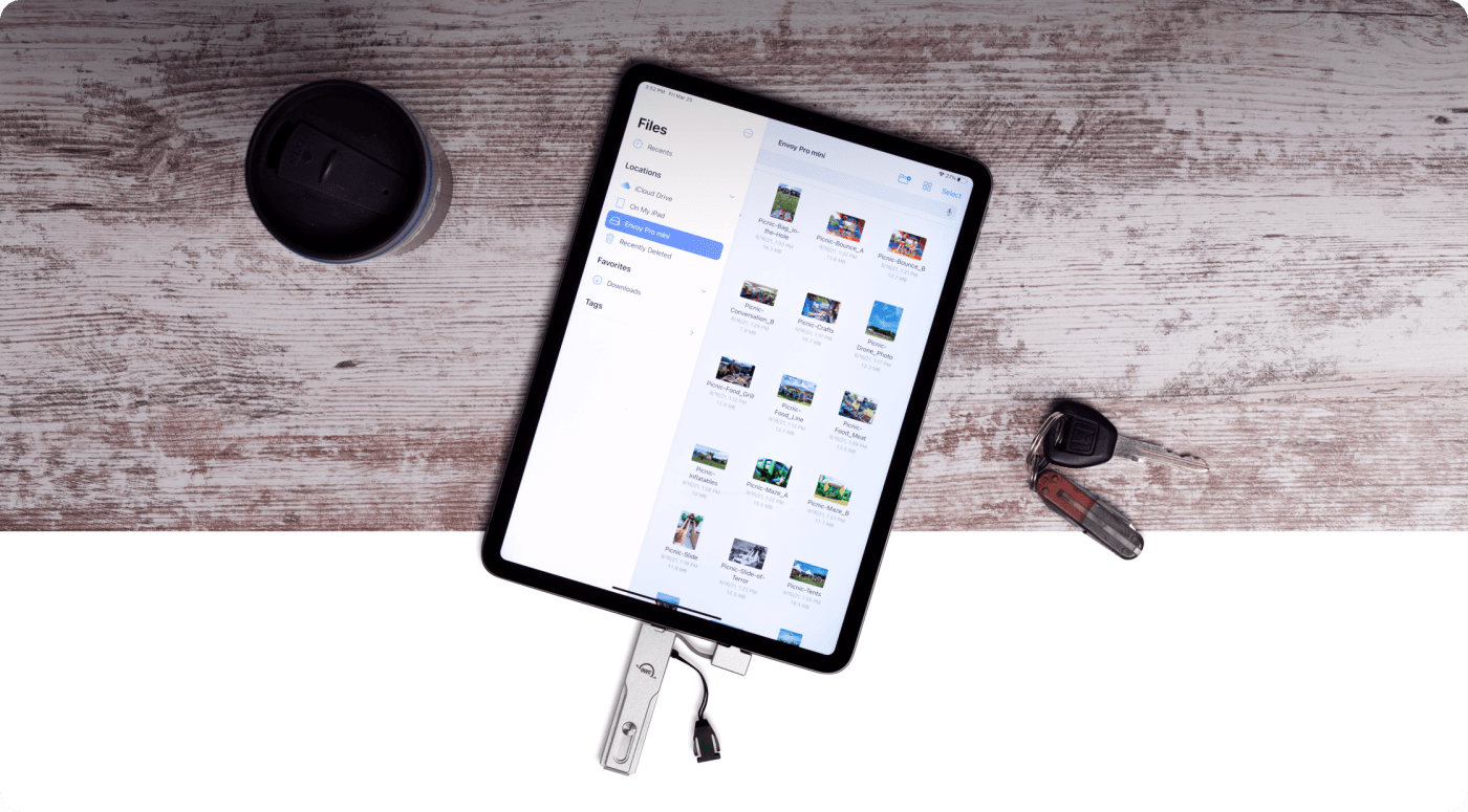 Envoy Pro mini plugged into an iPad Pro on a tabletop