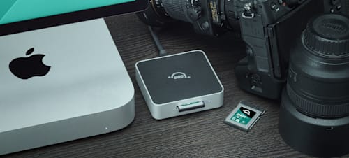 OWC Atlas Core CFexpress Memory Cards on desktop with camera and Mac mini