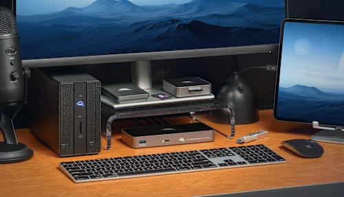 OWC Thunderbolt 5 Hub on desktop with OWC Gemini, OWC Envoy Ultra, OWC USB4 CFexpress 4.0 Type B Card Reader, OWC Envoy Pro mini, and more