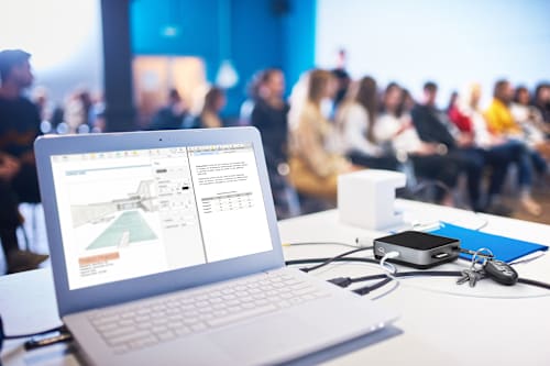 Laptop using OWC USB-C Travel Dock to run presentation