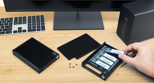 OWC U2 Shuttle on desktop showing with M.2 SSDs inside