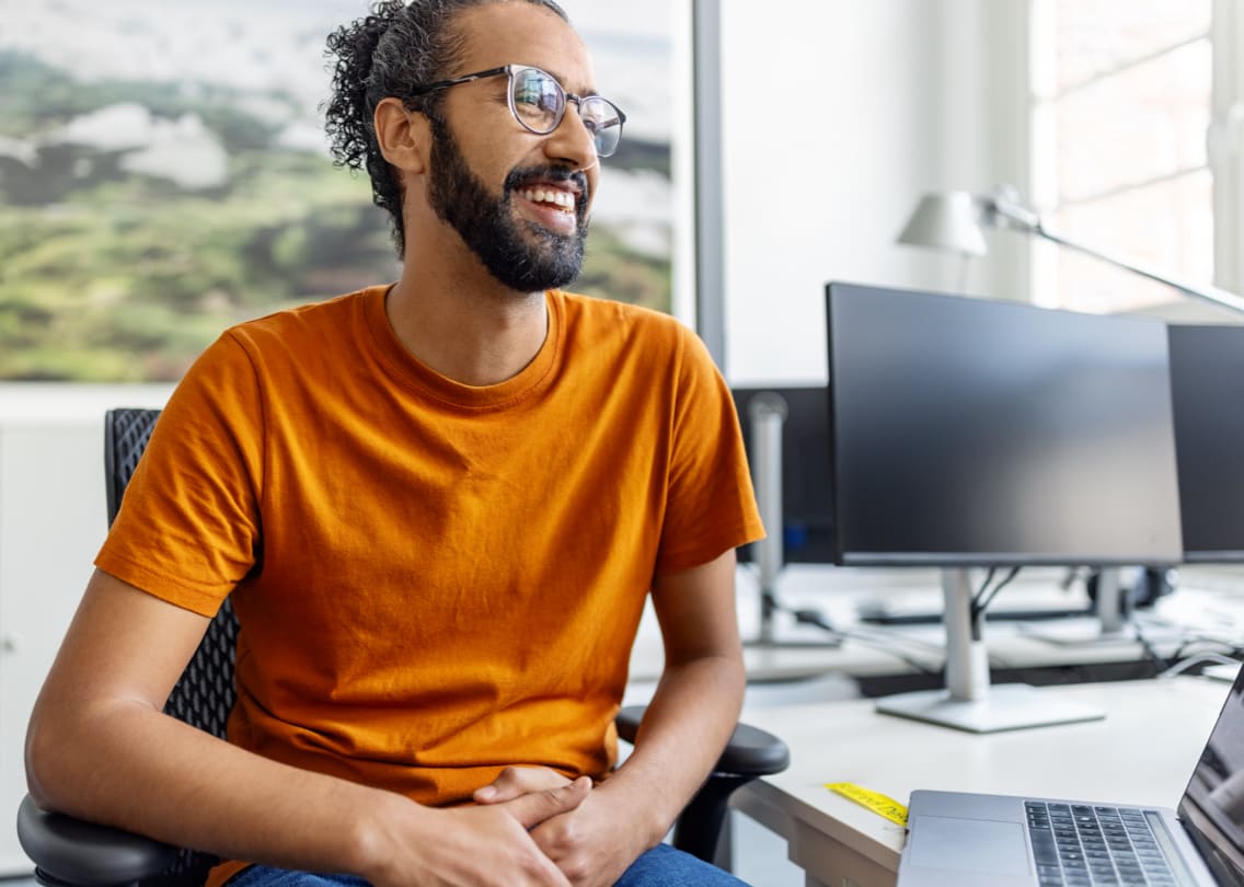 Man enjoying Mac Laptop