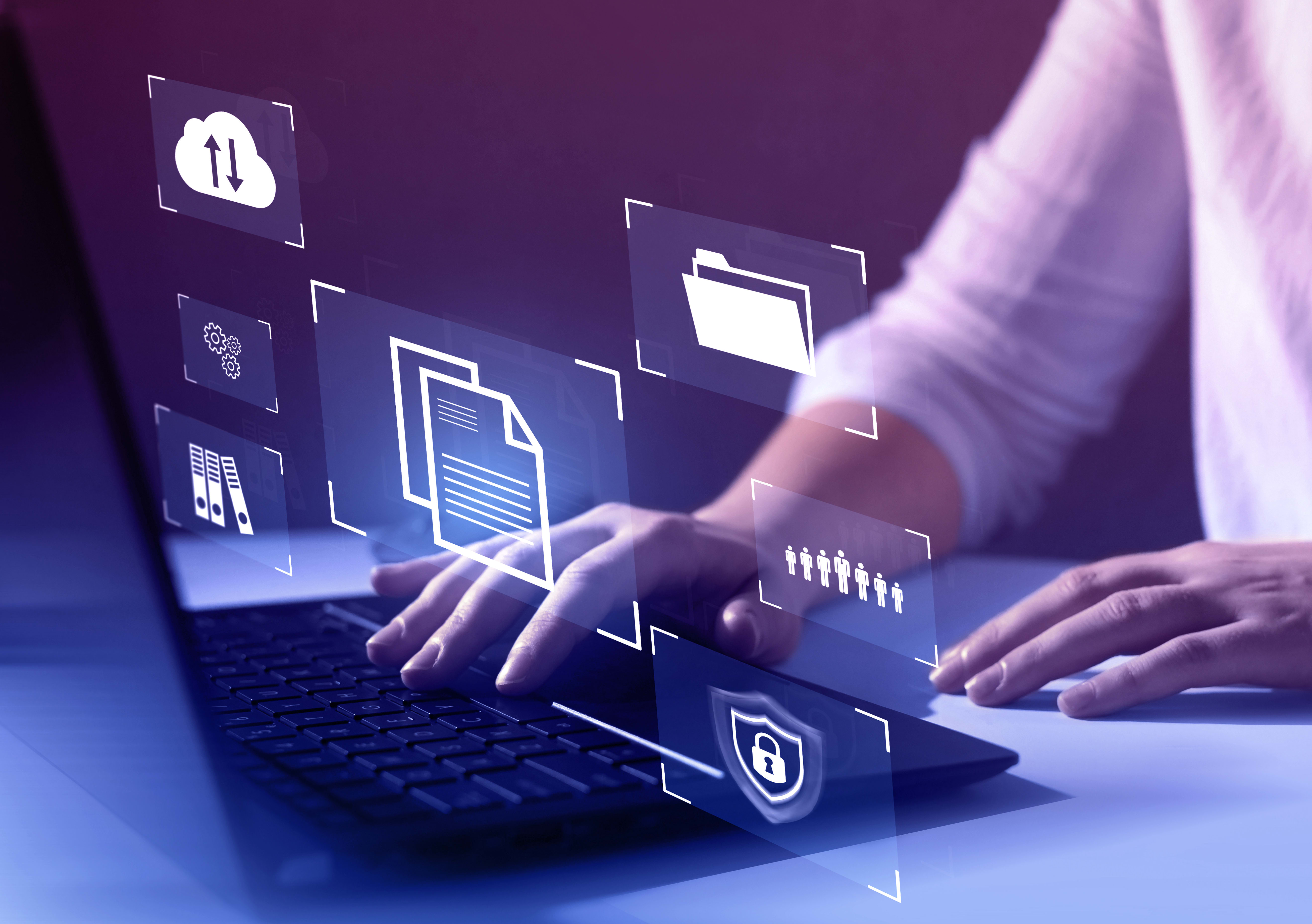 User operating a laptop with visual depiction of content source