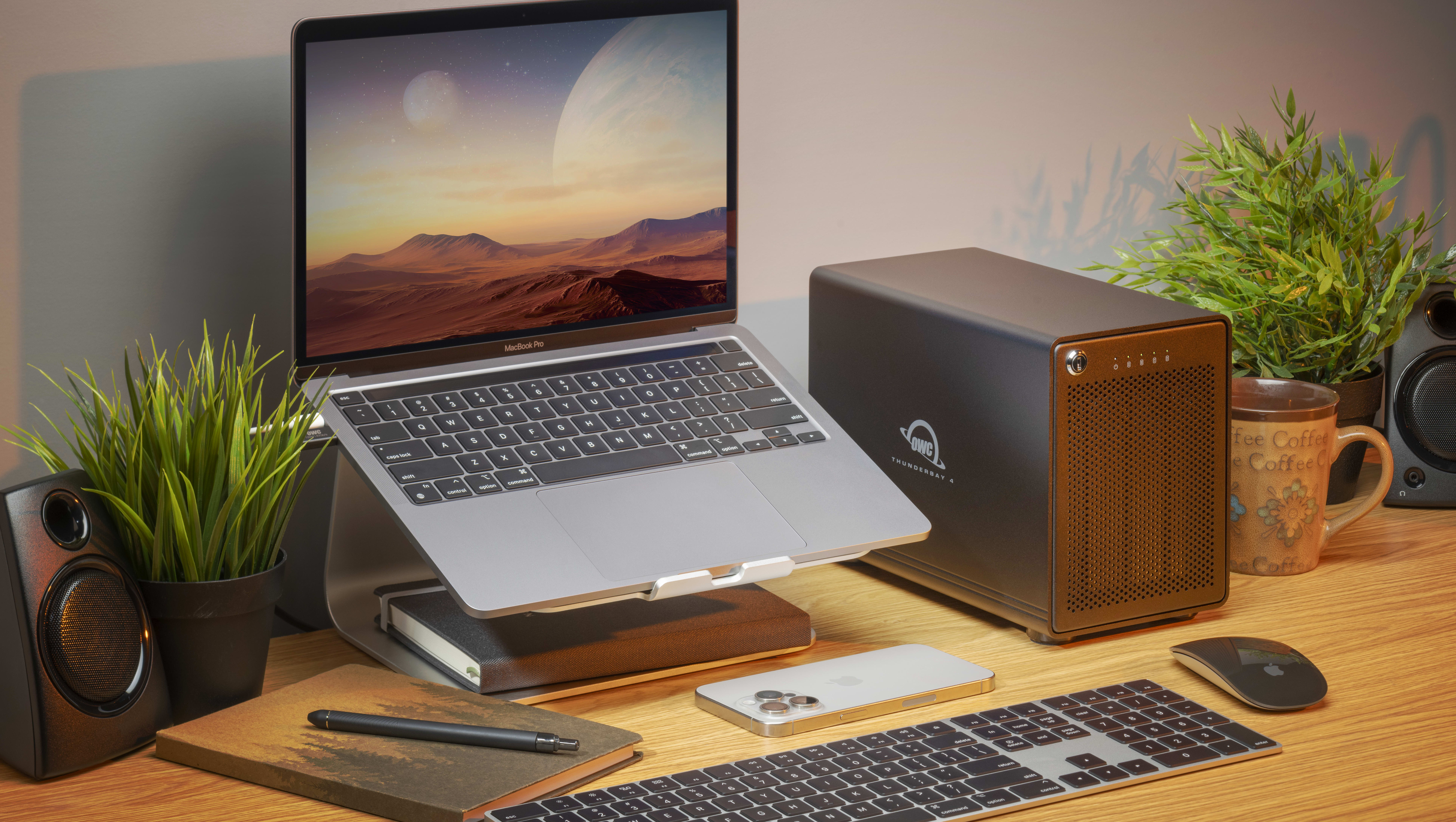 OWC ThunderBay 4 on desk with MacBook Pro