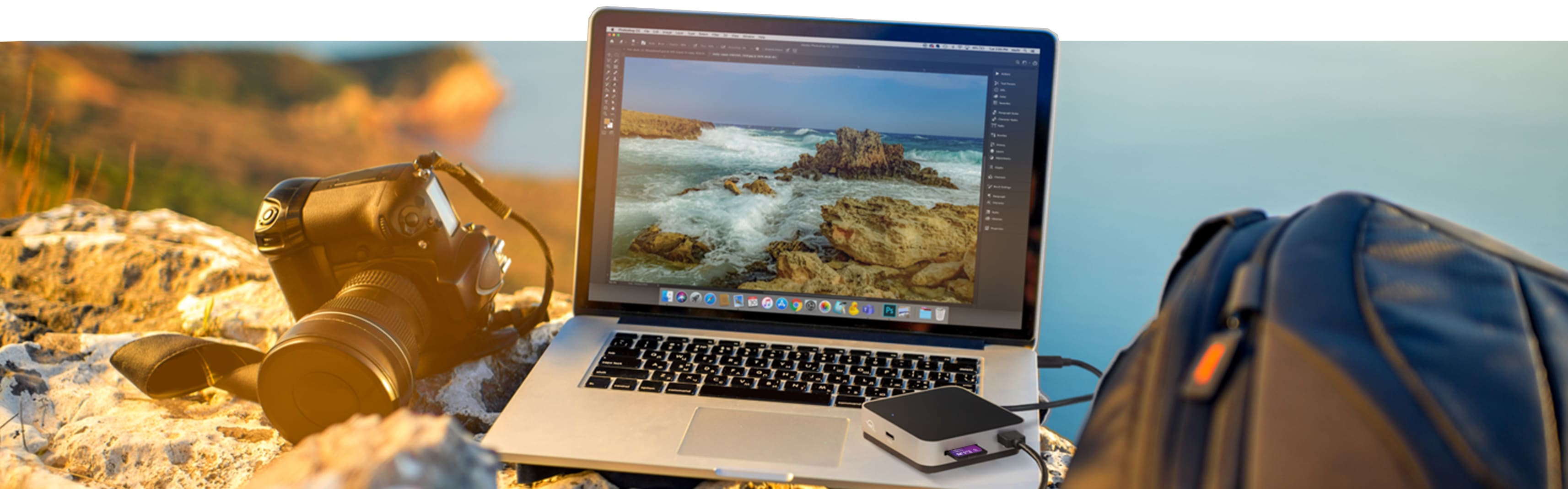 OWC USB-C Travel Dock with photography equipment and MacBook Pro