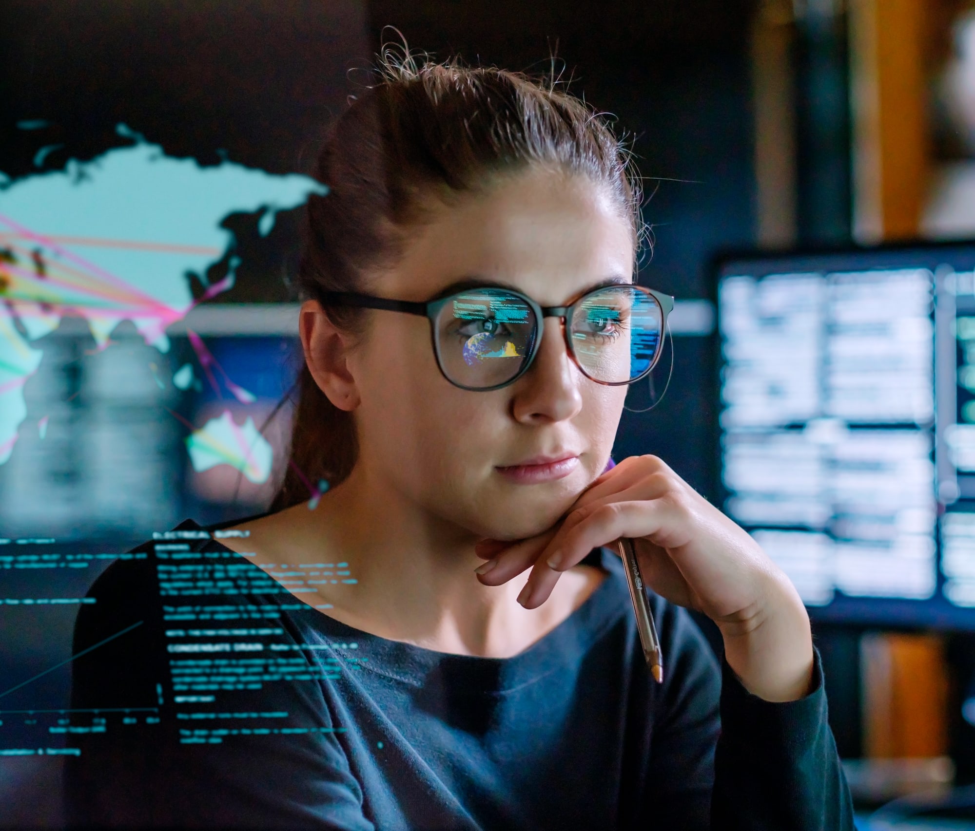 Woman in front of video screen